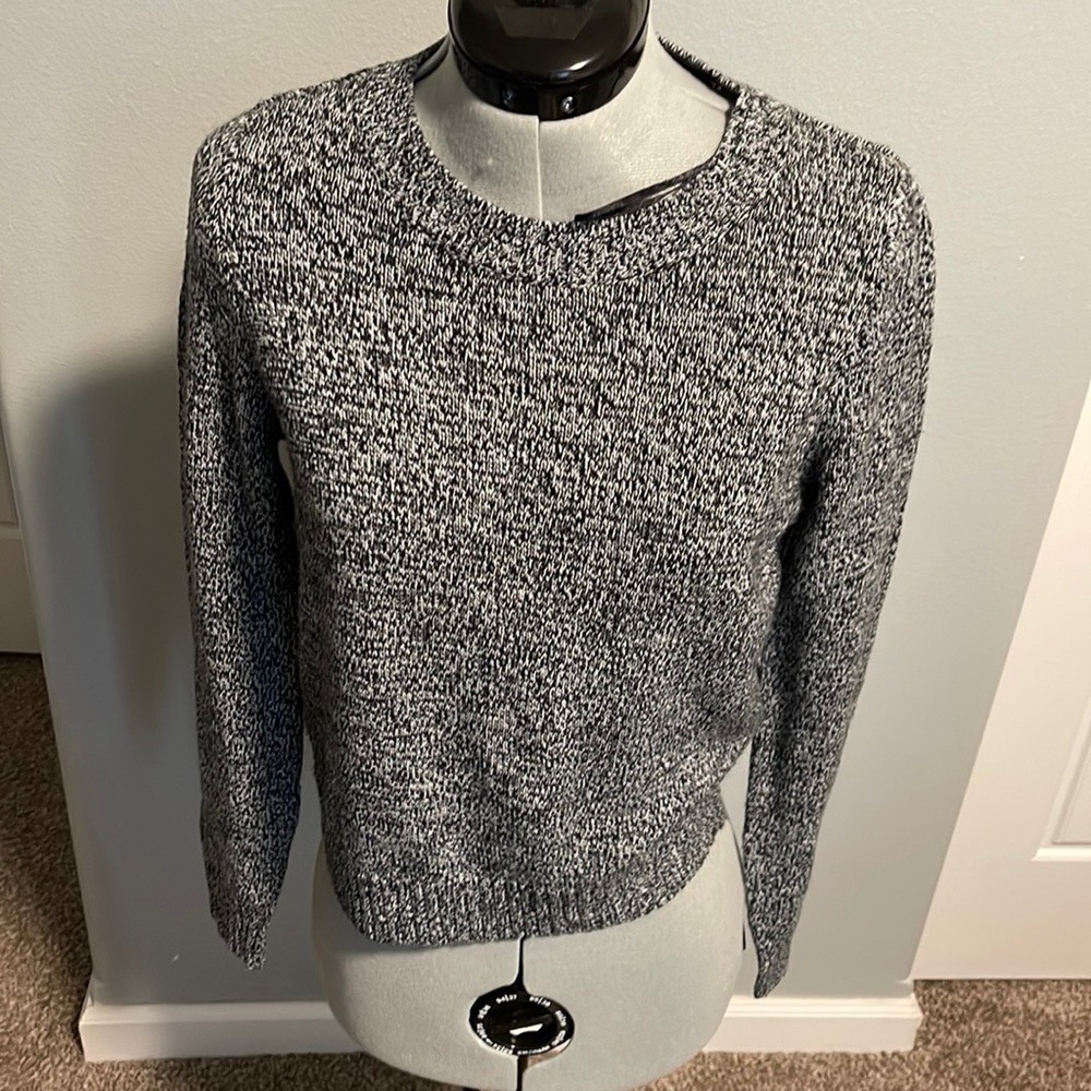 Divided woman’s sweater